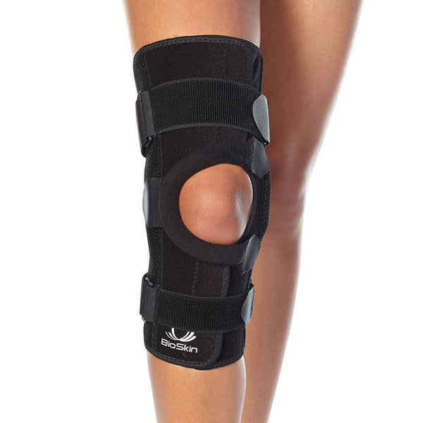 Patellofemoral Tracking Wraparound Knee Brace with Dynamic Lateral Support and Flexible Hinges.