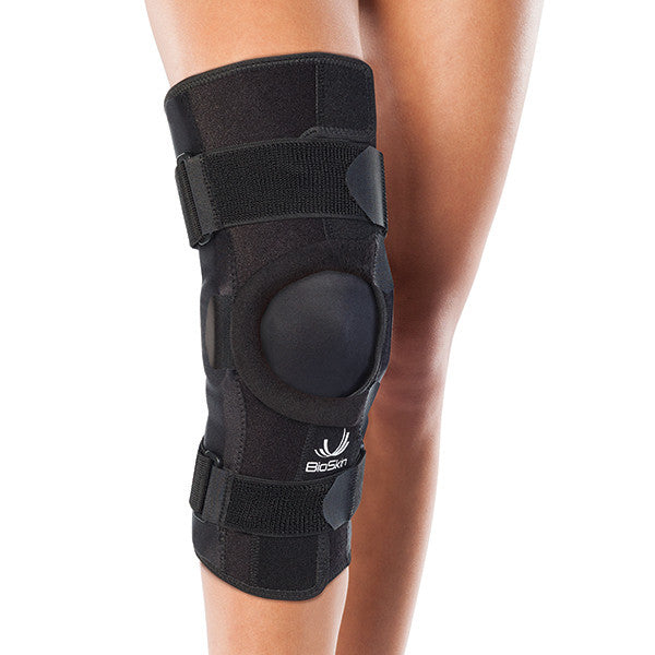 Patellofemoral Tracking Wraparound Knee Brace with Dynamic Lateral Support and Flexible Hinges.